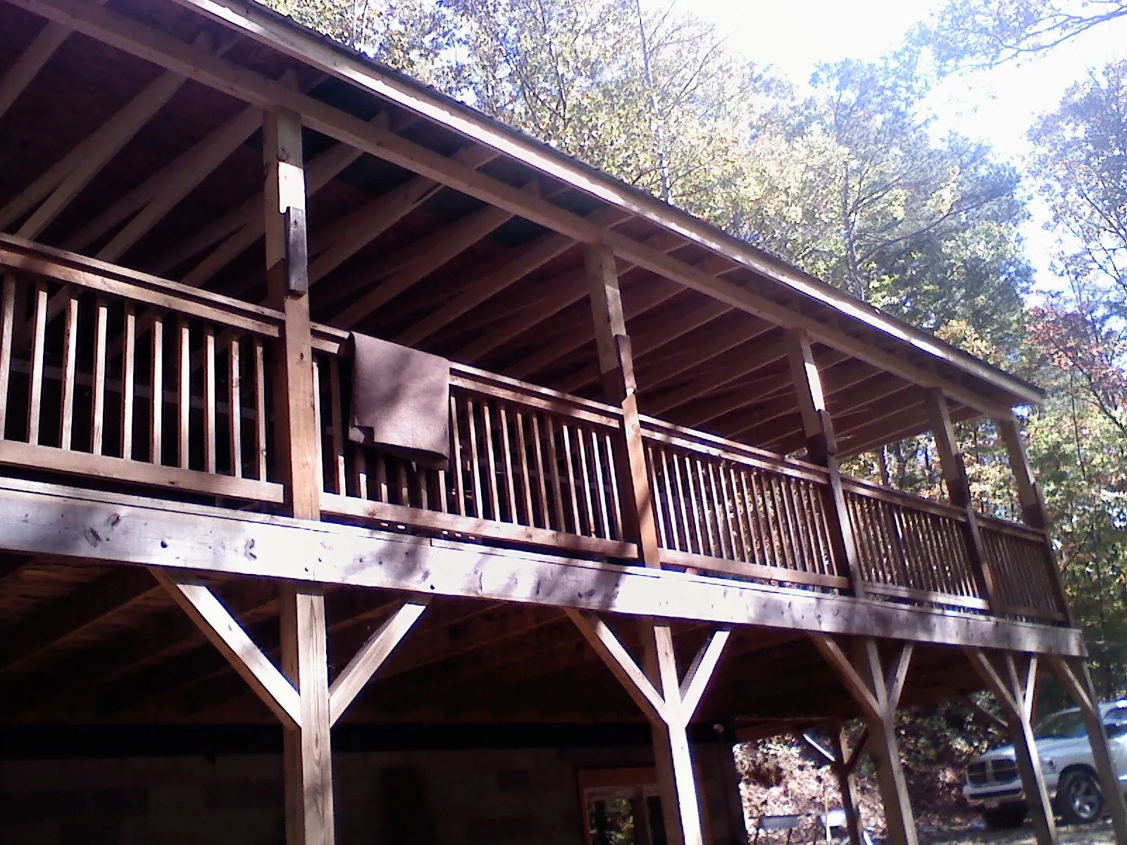 Timber framing under a new elevated porch and deck — Roof Leak Repair in Hiawatha by Roofing Brothers
